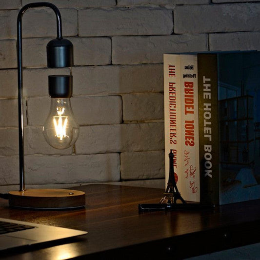 المصباح الكهربائي العائم مع شاحن هاتف لاسلكي - Makfool